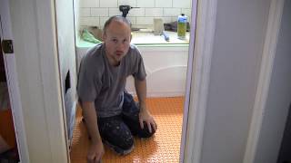 How to Tile a Bathroom 46 Installing the SchlüterDITRA Mat [upl. by Limaa]